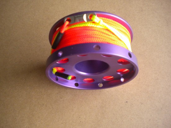 New100ftAnodizedAluminumFlangeEdgeFingerSpoolwORANGELinelineswivelPurpleSpool