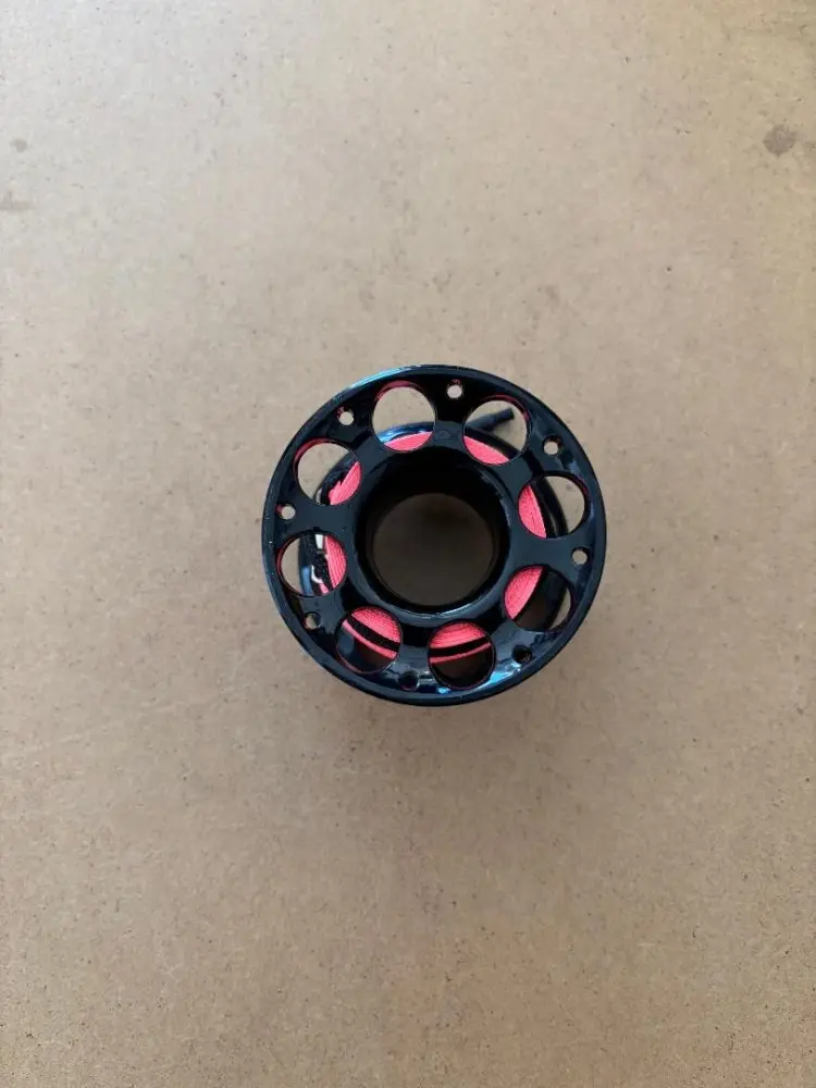 50FTPolycarbonateEngineeredFingerSpoolTecBlackBody-NeonOrangeLine