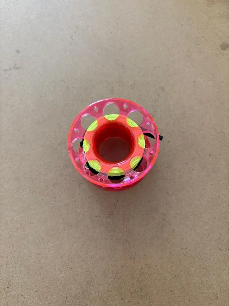 50FTPolycarbonateEngineeredFingerSpoolTransparentPinkBody-NeonYellowLine