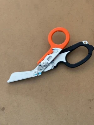 Back in Stock! Folding Compact Line Shears " ORANGE-BLACK Handles / 420 SS Blade" - Product Image