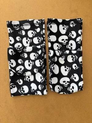 New! Spandex Tubular Watersocks " Skulls Design" - Product Image