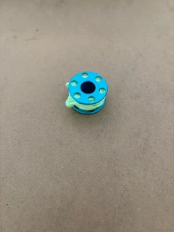 Ultra Mini Jumper Finger Spool "Aqua Blue Body" Neon Yellow Line