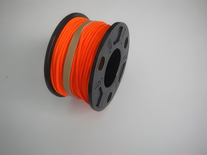 75ft Molded Large Hole Finger Spool w/ ORANGE #24 Line - Product Image