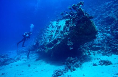 scuba diver at sunken ship
